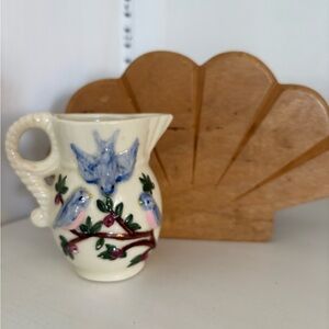 Handcrafted Ceramic Vase with Blue and Pink Bird Design